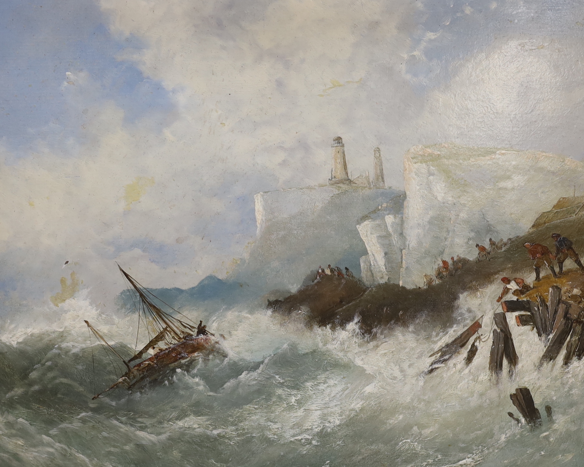 19th century English School, oil on board, Coastal scene with shipwreck before a lighthouse, 39 x 49cm